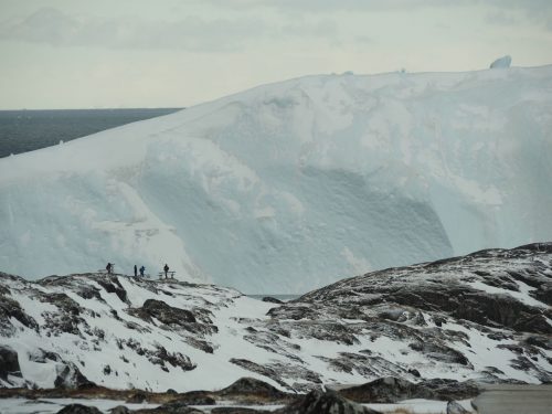 Ramon Larramendi Expedition 2024-SOS-ARCTIC-–-Greenland-SouthGiant-iceberg-with-people-for-reference